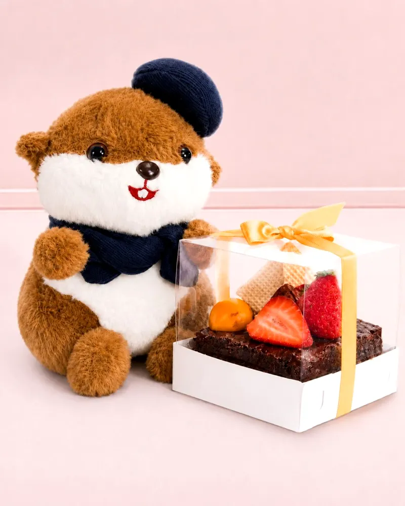 Peluche Castorcito y torta de chocolate